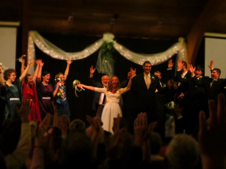 After the pronouncement, every one cried "Ta-da" at the bride's request. Photo by Amy Bahe.