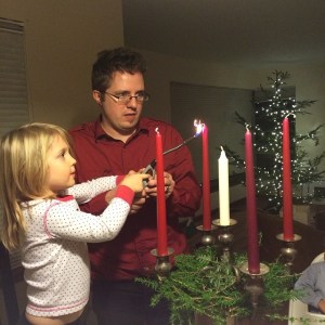 Our granddaughter Sarina lights the candle of hope with her dad Christian on December 1, 2013.  